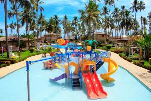 a water slide at a resort with a water park at Grand Oca Maragogi All Inclusive Resort in Maragogi