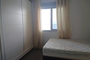 Postel nebo postele na pokoji v ubytování LA MANGA BEACH CLUB RESORT