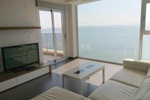 TV a/nebo společenská místnost v ubytování LA MANGA BEACH CLUB RESORT