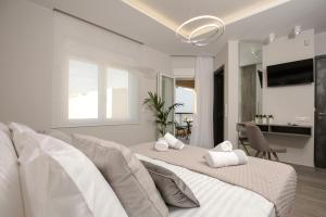 TV a/nebo společenská místnost v ubytování Limosa Luxury Residences