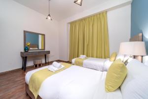 Cama o camas de una habitación en Icon Casa Living - Bahar 4 Residence - JBR
