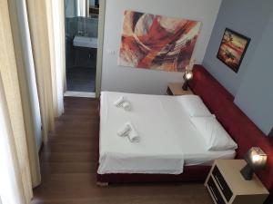 Postel nebo postele na pokoji v ubytování Perandor Beach