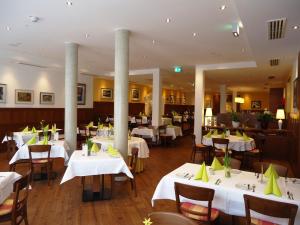 Ресторант или друго място за хранене в Hotel Gasthof Posthalter