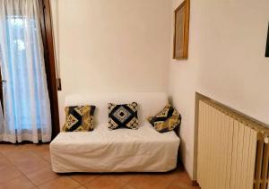 A bed or beds in a room at Little Star pioppa
