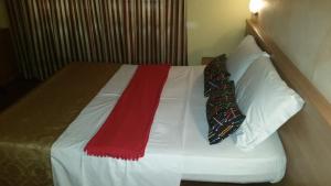 Postel nebo postele na pokoji v ubytování Hotel Chopin