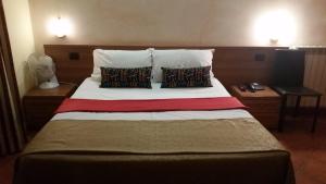 Postel nebo postele na pokoji v ubytování Hotel Chopin + 30 fotografií