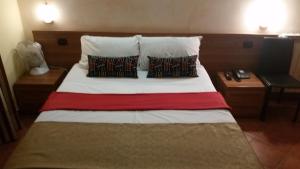 Postel nebo postele na pokoji v ubytování Hotel Chopin