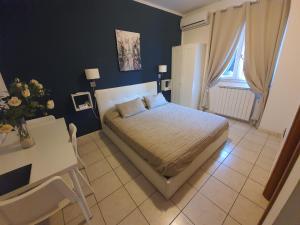 Postel nebo postele na pokoji v ubytování Guest House Brezza Marina