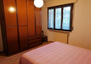A bed or beds in a room at Little Star pioppa Még 11 kép