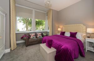 Ένα ή περισσότερα κρεβάτια σε δωμάτιο στο Albany House by Harrogate Serviced Apartments