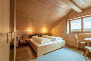 Postel nebo postele na pokoji v ubytování Forsthaus Schoppernau