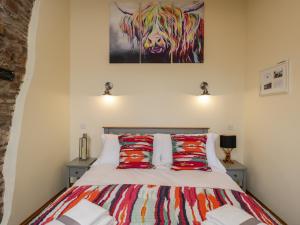 Postel nebo postele na pokoji v ubytování The Comfy Cow