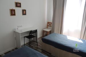 Letto o letti in una camera di Hotel Lopota Gate