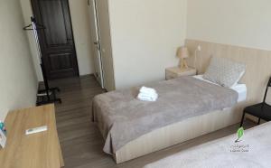 Letto o letti in una camera di Hotel Lopota Gate