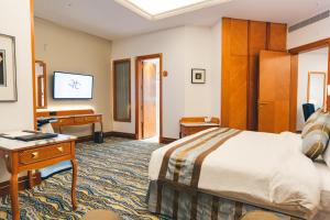 Sjónvarps- og/eða afþreyingartæki á Iridium Hotel