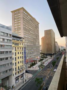 a view of a city street with tall buildings at The Postcard Avenue in Lisbon