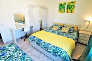 Posteľ alebo postele v izbe v ubytovaní MARILU SEAVIEW & BEACH - apartment