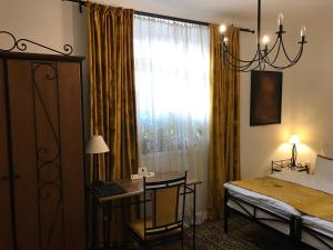Voodi või voodid majutusasutuse Antik Hotel Sofia toas