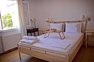 Voodi või voodid majutusasutuse ELENA APARTMENTS ITHACa toas