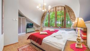 Posteľ alebo postele v izbe v ubytovaní Apartamenty Kurort