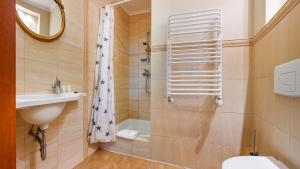 Kúpeľňa v ubytovaní Apartamenty Kurort