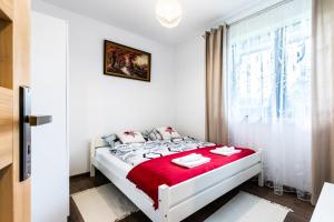 Posteľ alebo postele v izbe v ubytovaní Apartamenty "Zielony Zakątek" Olcza Zakopane