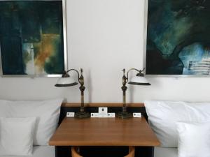 Voodi või voodid majutusasutuse Antik Hotel Sofia toas