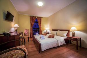 Postel nebo postele na pokoji v ubytování Eco Friendly Hotel Dália