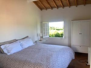 Postel nebo postele na pokoji v ubytování Quinta dos Sabores Farm Houses