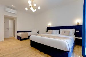 Postel nebo postele na pokoji v ubytování SM Vatican Relais B&B