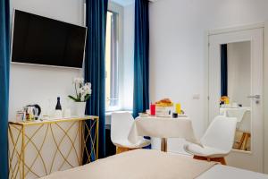 TV a/nebo společenská místnost v ubytování SM Vatican Relais B&B