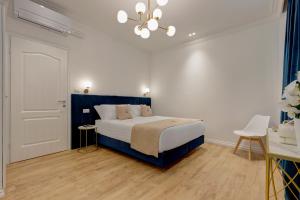 Postel nebo postele na pokoji v ubytování SM Vatican Relais B&B