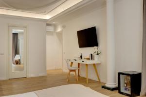 TV a/nebo společenská místnost v ubytování SM Vatican Relais B&B