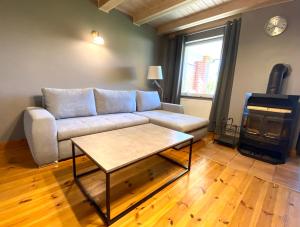 Posezení v ubytování Apartamenty Jarzębinowa 17