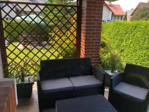 Posezení v ubytování Apartamenty Jarzębinowa 17