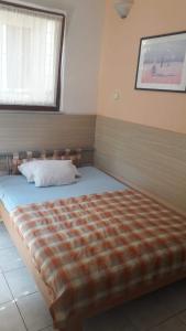 Llit o llits en una habitació de Apartment Kordić