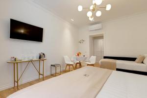 Postel nebo postele na pokoji v ubytování SM Vatican Relais B&B