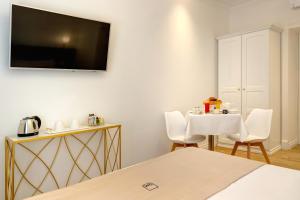 TV a/nebo společenská místnost v ubytování SM Vatican Relais B&B