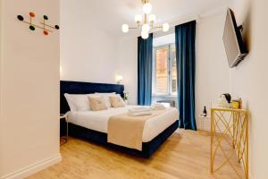 Postel nebo postele na pokoji v ubytování SM Vatican Relais B&B