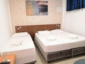 Postel nebo postele na pokoji v ubytování Guesthouse Villa Paškal