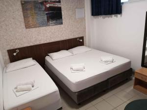 Postel nebo postele na pokoji v ubytování Guesthouse Villa Paškal