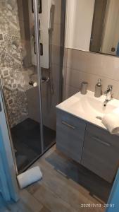 a bathroom with a shower and a sink and a showerspective at Rigoletto Holiday Home,Centrocittà Palermo in Palermo +21 photos