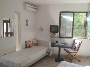 Llit o llits en una habitació de Apartment Kordić