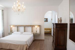 Postel nebo postele na pokoji v ubytování Il Palazzetto
