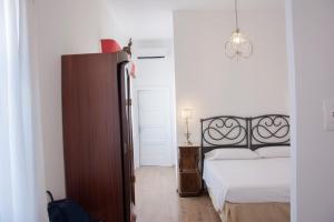 Postel nebo postele na pokoji v ubytování Il Palazzetto