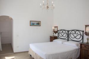 Postel nebo postele na pokoji v ubytování Il Palazzetto
