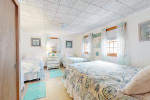 Letto o letti in una camera di Paradise by Ocean Edge
