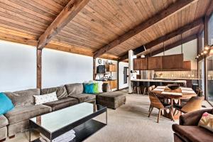 a living room with a couch and a table at Family-Friendly Glen Home with White Mountain Views! in Glen
