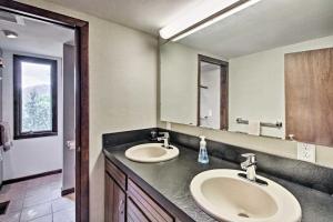 a bathroom with two sinks and a large mirror at Family-Friendly Glen Home with White Mountain Views! in Glen +17 photos