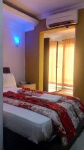 Katil atau katil-katil dalam bilik di TheoDawn Hotels @ Suite 29